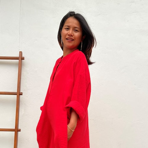 Fiery, powerful red kaftans and dresses handmade in Thailand