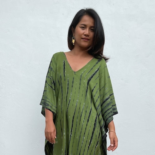 Handmade cotton dresses and caftans in a variety of green colors and shades